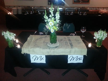 Mr. and Mrs. table for a wedding in the banquet room of the Village Inn.